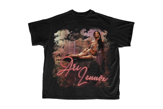 Ari Lennox tee in black with pink and light purple as the main colors in the design